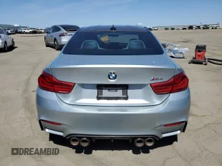2015 BMW M4 with VIN WBS3R9C52FK334020, listed as a Copart auction lot 51867985 with 95,369 mi miles and Salvage title. Bid and sale history available at DreamBid. Image 6.