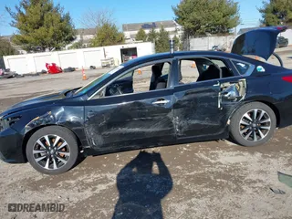 2018 Nissan Altima 2.5 SV with VIN 1N4AL3AP5JC265091, listed as a IAAI auction lot 41293465 with 102,343 mi miles. Bid and sale history available at carsss.com. Image 18.