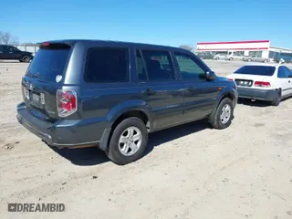 2006 Honda Pilot LX with VIN 5FNYF18106B029559, listed as a IAAI auction lot 41577540 with 353,109 mi miles. Bid and sale history available at carsss.com. Image 4.