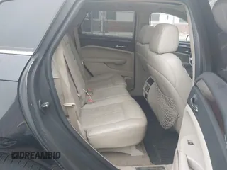 2011 Cadillac SRX Luxury Collection with VIN 3GYFNAEY2BS555800, listed as a IAAI auction lot 42118889 with 172,614 mi miles and . Bid and sale history available at carsss.com. Image 8.