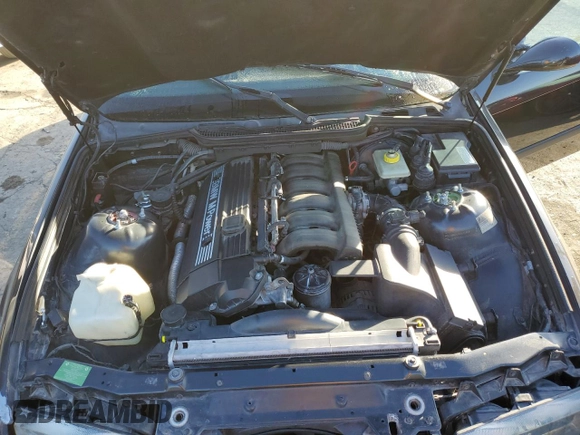 1998 BMW M3 z VIN WBSCD932XWEE08919, wystawiony jako Copart lot #84434704 z przebiegiem Nie podano mil oraz Szkody całkowita. Historia ofert i sprzedaży dostępna na DreamBid. Obrazek 11.
