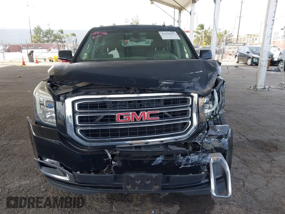2016 GMC Yukon XL SLE with VIN 1GKS1FKC2GR147222, listed as a IAAI auction lot 41390201 with 86,385 mi miles. Bid and sale history available at carsss.com. Image 12.