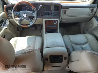2004 Cadillac Escalade z VIN 1GYEK63N24R251463, wystawiony jako Copart lot #59404565 z przebiegiem 215 203 mil mil oraz Czysty tytuł • Clean title. Historia ofert i sprzedaży dostępna na DreamBid. Obrazek 8.