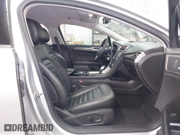 2013 Ford Fusion SE Hybrid with VIN 3FA6P0LU7DR228691, listed as a IAAI auction lot 42055540 with 144,389 mi miles and . Bid and sale history available at DreamBid. Image 5.