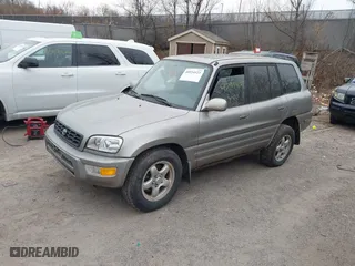 1999 Toyota RAV4 with VIN JT3HP10V8X7137998, listed as a IAAI auction lot 40954121 with 132,824 mi miles. Bid and sale history available at carsss.com. Image 2.