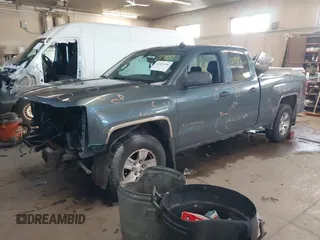 2014 Chevrolet Silverado 1500 LT with VIN 1GCVKREC0EZ130211, listed as a IAAI auction lot 41601900 with 209,604 mi miles and . Bid and sale history available at DreamBid. Image 2.