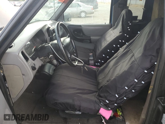 1999 Ford Ranger XL with VIN 1FTZR15V1XPB88455, listed as a Copart auction lot 61976915 with 117,711 mi miles and Salvage title. Bid and sale history available at DreamBid. Image 7.