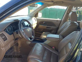 2006 Honda Pilot EX-L with VIN 5FNYF18766B008879, listed as a IAAI auction lot 41797763 with 398,242 mi miles and . Bid and sale history available at DreamBid. Image 5.