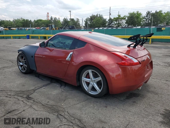 2013 Nissan 370Z Touring z VIN JN1AZ4EH9DM381350, wystawiony jako Copart lot #59375295 z przebiegiem 100 832 mil mil oraz Czysty tytuł • Clean title. Historia ofert i sprzedaży dostępna na DreamBid. Obrazek 2.