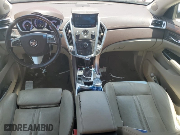 2012 Cadillac SRX Premium Collection with VIN 3GYFNCE39CS518034, listed as a Copart auction lot 65373925 with 50,684 mi miles and Salvage title. Bid and sale history available at DreamBid. Image 8.