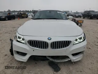 2016 BMW Z4 sDrive35i z VIN WBALM7C52G5B60024, wystawiony jako Copart lot #49235955 z przebiegiem 16 673 mil mil oraz Szkoda całkowita • Salvage title. Historia ofert i sprzedaży dostępna na DreamBid. Obrazek 5.