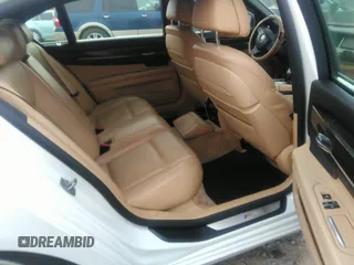 2015 BMW 7 Series 750Li with VIN WBAYE8C50FD781160, listed as a IAAI auction lot 41061232 with 154,496 mi miles. Bid and sale history available at carsss.com. Image 8.