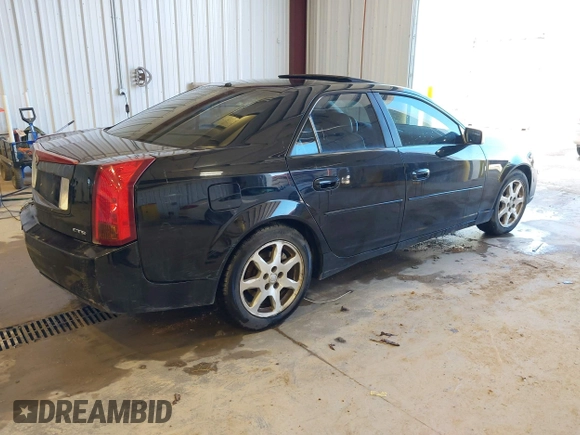 2003 Cadillac CTS with VIN 1G6DM57N630145426, listed as a IAAI auction lot 42141105 with 203,859 mi miles. Bid and sale history available at carsss.com. Image 4.