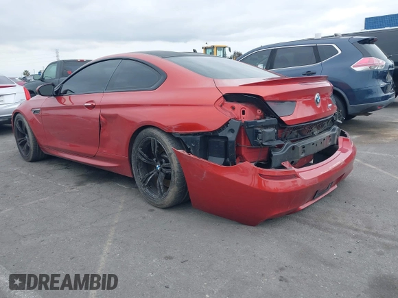 2013 BMW M6 z VIN WBSLX9C55DC968497, wystawiony jako IAAI lot #41863884 z przebiegiem 128 241 mil mil oraz . Historia ofert i sprzedaży dostępna na DreamBid. Obrazek 3.