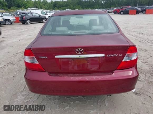 2002 Toyota Camry LE z VIN 4T1BE30K32U110304, wystawiony jako IAAI lot #42357455 z przebiegiem 221 389 mil mil oraz . Historia ofert i sprzedaży dostępna na DreamBid. Obrazek 16.