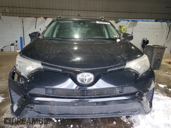 2017 Toyota RAV4 LE with VIN 2T3BFREV7HW601557, listed as a Copart auction lot 46050215 with 128,757 mi miles and Salvage Title. Bid and sale history available at DreamBid. Image 5.