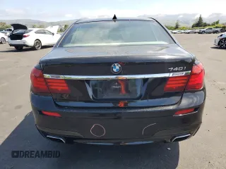 2013 BMW 7 Series 740i with VIN WBAYA6C58DC994974, listed as a Copart auction lot 55534645 with 106,975 mi miles and Salvage title. Bid and sale history available at DreamBid. Image 6.