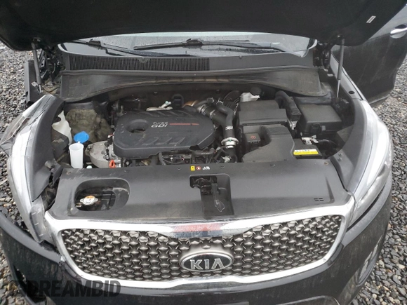 2016 Kia Sorento SXL z VIN 5XYPKDA19GG012725, wystawiony jako Copart lot #80313254 z przebiegiem 86 852 mil mil oraz Szkoda całkowita • Salvage title. Historia ofert i sprzedaży dostępna na DreamBid. Obrazek 13.