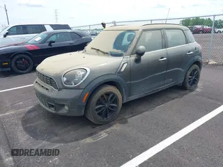 2014 MINI Countryman S with VIN WMWZC3C59EWP25041, listed as a IAAI auction lot 42085698 with 109,320 mi miles and . Bid and sale history available at DreamBid. Image 2.