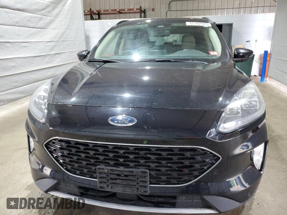 2020 Ford Escape Titanium с VIN 1FMCU9J92LUA37546, выставлен на аукционе Copart как лот 55102925 с пробегом 83 059 миль миль и Списание • Salvage title. История ставок и продаж доступна на DreamBid. Изображение 5.