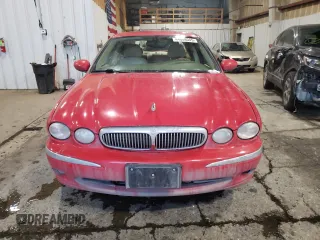 2004 Jaguar X-Type with VIN SAJEA51CX4WE15195, listed as a Copart auction lot 57868405 with 171,698 mi miles and Non Repairable. Bid and sale history available at DreamBid. Image 5.