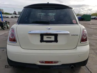 2012 MINI Hardtop with VIN WMWSU3C51CT186184, listed as a Copart auction lot 55090935 with 100,669 mi miles and Salvage Title. Bid and sale history available at DreamBid. Image 6.