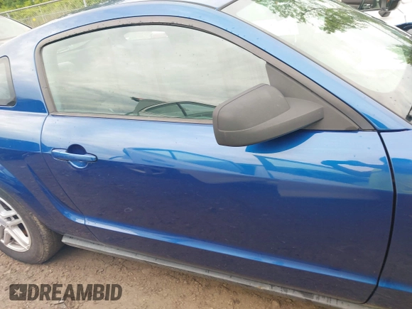 2009 Ford Mustang with VIN 1ZVHT80N795142637, listed as a IAAI auction lot 42595602 with 69,284 mi miles and . Bid and sale history available at DreamBid. Image 14.