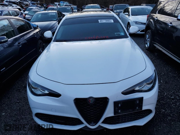 2019 Alfa Romeo Giulia Ti z VIN ZARFANBN0K7608050, wystawiony jako Copart lot #89119965 z przebiegiem 80 559 mil mil oraz Szkoda całkowita • Salvage title. Historia ofert i sprzedaży dostępna na DreamBid. Obrazek 5.