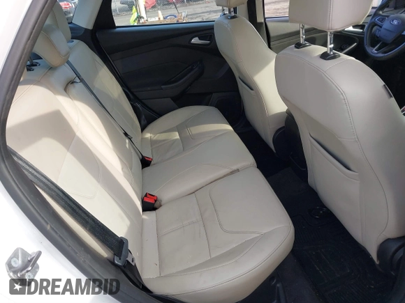 2018 Ford Focus Titanium z VIN 1FADP3J25JL293835, wystawiony jako IAAI lot #41877487 z przebiegiem 109 211 mil mil oraz . Historia ofert i sprzedaży dostępna na DreamBid. Obrazek 8.
