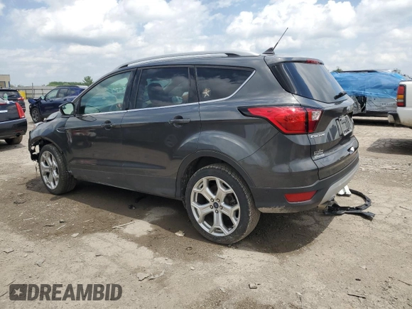 2019 Ford Escape Titanium with VIN 1FMCU0J93KUA81968, listed as a Copart auction lot 56232665 with 26,631 mi miles and Salvage title. Bid and sale history available at DreamBid. Image 2.