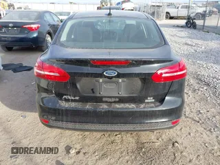 2016 Ford Focus SE z VIN 1FADP3FEXGL310270, wystawiony jako IAAI lot #40956503 z przebiegiem 156 812 mil mil oraz . Historia ofert i sprzedaży dostępna na DreamBid. Obrazek 17.