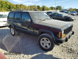 2001 Jeep Cherokee Sport z VIN 1J4FF58S61L612533, wystawiony jako Copart lot #76824714 z przebiegiem 62 401 mil mil oraz Szkoda całkowita • Salvage title. Historia ofert i sprzedaży dostępna na DreamBid. Obrazek 4.