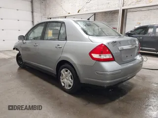 2011 Nissan Versa S with VIN 3N1BC1AP9BL485989, listed as a IAAI auction lot 42414692 with 122,213 mi miles and . Bid and sale history available at DreamBid. Image 3.