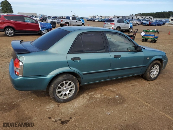 2001 Mazda Protege DX with VIN JM1BJ222310433605, listed as a Copart auction lot 49156215 with 205,146 mi miles and Salvage Title. Bid and sale history available at carsss.com. Image 3.
