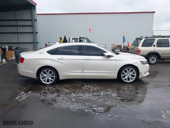 2014 Chevrolet Impala LTZ with VIN 1G1155S38EU105260, listed as a IAAI auction lot 42012082 with 230,407 mi miles. Bid and sale history available at carsss.com. Image 13.