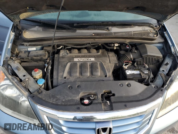 2009 Honda Odyssey EX-L with VIN 5FNRL38759B004710, listed as a Copart auction lot 54210425 with 171,674 mi miles and Salvage Title. Bid and sale history available at DreamBid. Image 12.