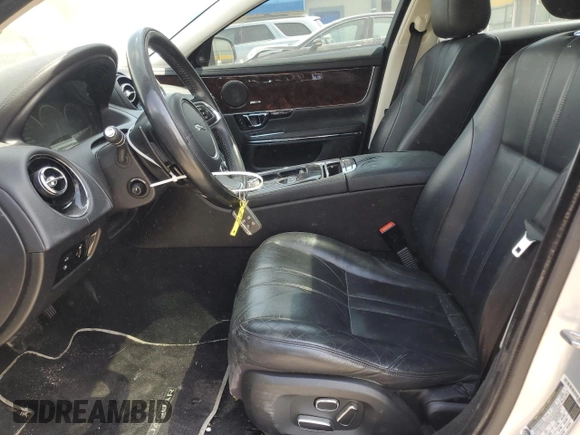 2015 Jaguar XJ with VIN SAJWJ1CD1F8V75232, listed as a Copart auction lot 57605685 with 146,314 mi miles and Salvage title. Bid and sale history available at DreamBid. Image 7.