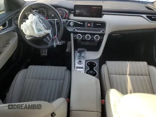 2023 Genesis G70 2.0T with VIN KMTG34TA3PU105184, listed as a Copart auction lot 77366344 with 36,582 mi miles and Salvage Title. Bid and sale history available at carsss.com. Image 8.