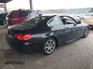 2007 BMW 3 Series 328xi with VIN WBAWC33517PD05082, listed as a IAAI auction lot 38964569 with 76,404 mi miles and . Bid and sale history available at DreamBid. Image 4.
