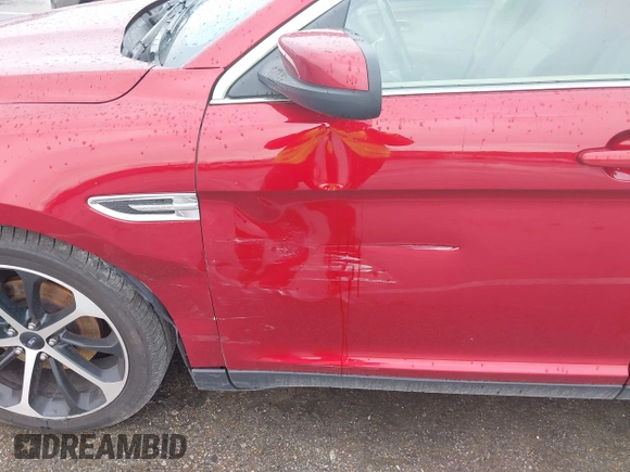 2014 Ford Taurus SEL z VIN 1FAHP2E83EG125622, wystawiony jako IAAI lot #42204238 z przebiegiem 134 032 mil mil oraz . Historia ofert i sprzedaży dostępna na DreamBid. Obrazek 6.