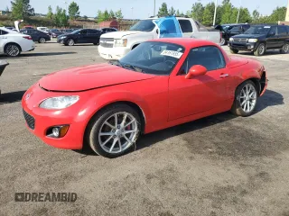 2009 Mazda MX-5 Miata Grand Touring with VIN JM1NC26F190204839, listed as a Copart auction lot 54161955 with 88,821 mi miles and Salvage title. Bid and sale history available at DreamBid. Image 1.