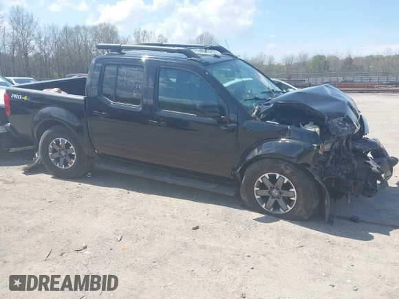 2014 Nissan Frontier SV with VIN 1N6AD0EV0EN758585, listed as a IAAI auction lot 41943169 with 186,214 mi miles and . Bid and sale history available at DreamBid. Image 1.