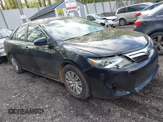 2014 Toyota Camry L with VIN 4T4BF1FK7ER395057, listed as a IAAI auction lot 42215441 with 166,247 mi miles and . Bid and sale history available at DreamBid. Image 1.
