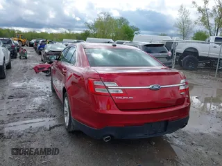 2018 Ford Taurus SEL z VIN 1FAHP2E85JG124997, wystawiony jako IAAI lot #42194985 z przebiegiem 86 456 mil mil oraz . Historia ofert i sprzedaży dostępna na DreamBid. Obrazek 3.