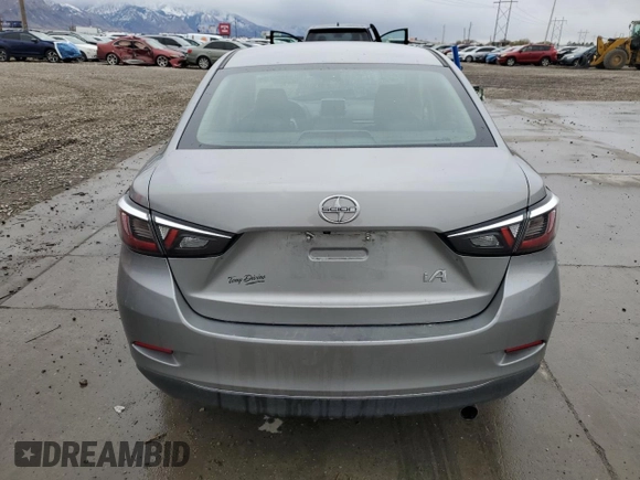 2016 Scion iA with VIN 3MYDLBZV5GY139285, listed as a Copart auction lot 49152105 with 133,197 mi miles and Salvage Title. Bid and sale history available at DreamBid. Image 6.