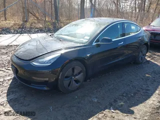 2018 Tesla Model 3 Long Range Battery with VIN 5YJ3E1EB5JF127358, listed as a IAAI auction lot 41759788 with 85,277 mi miles. Bid and sale history available at carsss.com. Image 19.