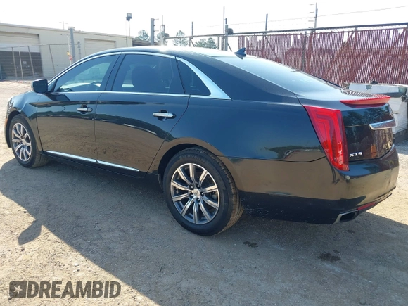 2013 Cadillac XTS Premium z VIN 2G61S5S34D9127996, wystawiony jako IAAI lot #41978539 z przebiegiem 185 157 mil mil oraz . Historia ofert i sprzedaży dostępna na DreamBid. Obrazek 3.