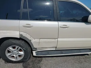2003 Lexus GX 470 with VIN JTJBT20X630019033, listed as a IAAI auction lot 42128698 with 286,811 mi miles and . Bid and sale history available at DreamBid. Image 6.