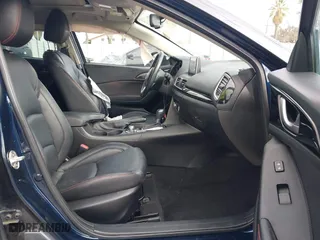 2016 Mazda Mazda3 i Grand Touring with VIN JM1BM1N74G1319656, listed as a IAAI auction lot 41561603 with 123,610 mi miles. Bid and sale history available at carsss.com. Image 5.