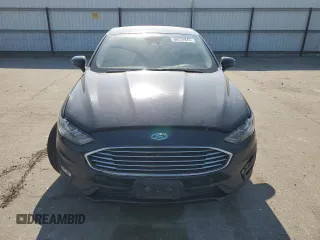 2020 Ford Fusion SE z VIN 3FA6P0HD4LR114834, wystawiony jako Copart lot #60224845 z przebiegiem 84 110 mil mil oraz Szkoda całkowita • Salvage title. Historia ofert i sprzedaży dostępna na DreamBid. Obrazek 5.